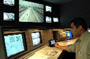 An operator working at his console in a TMC.
