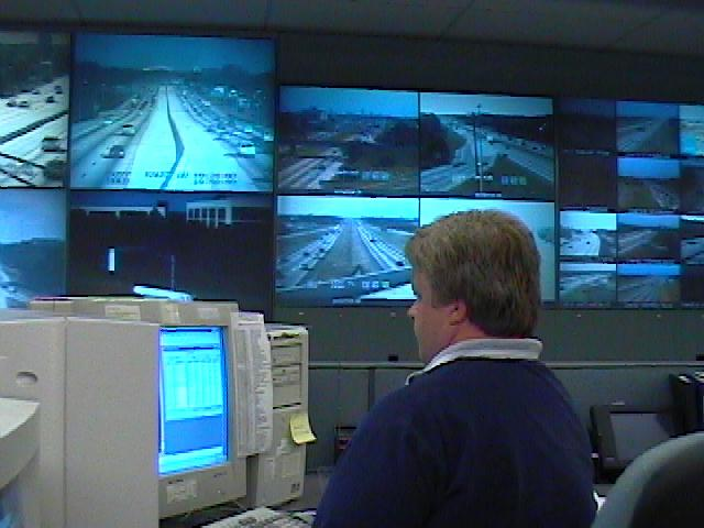 operator viewing camera images in a TMC control room